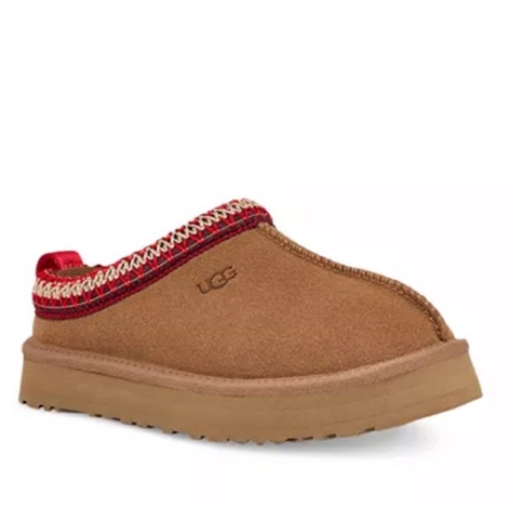 Never worn Ugg Tazz size 6 kids could fit a size 7 or 71/2 women’s.